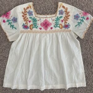Embroidered flower top with scallop crochet trim